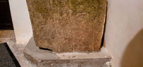 The base of the Kinnitty Stone, an ancient, possibly Christian artefact housed in St Finian's Church, Kinnitty, in Co. Offally, Ireland.