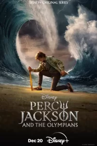 A teenaged boy with a shortsword kneels on a beach in front of crashing ocean waves and lightning, in a poster for the Disney+ Percy Jackson series.